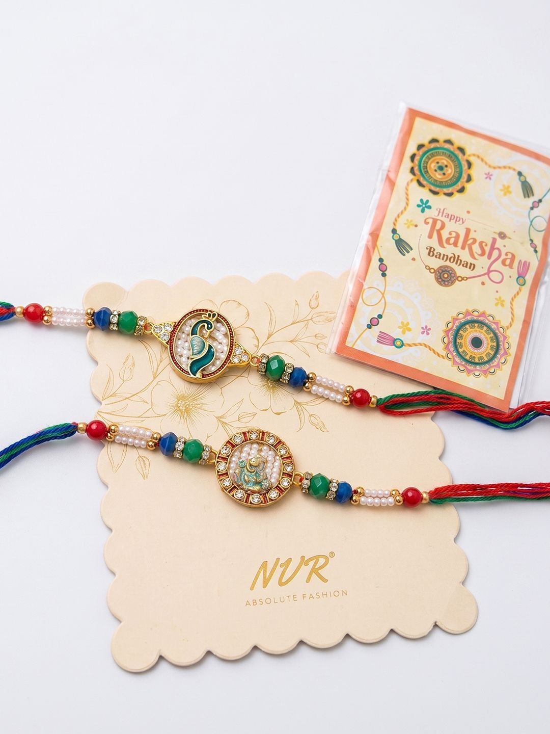 Anouk Set Of 2 Multicolor Peacock Design Rakhi With Roli Chawal Chandan Mishri