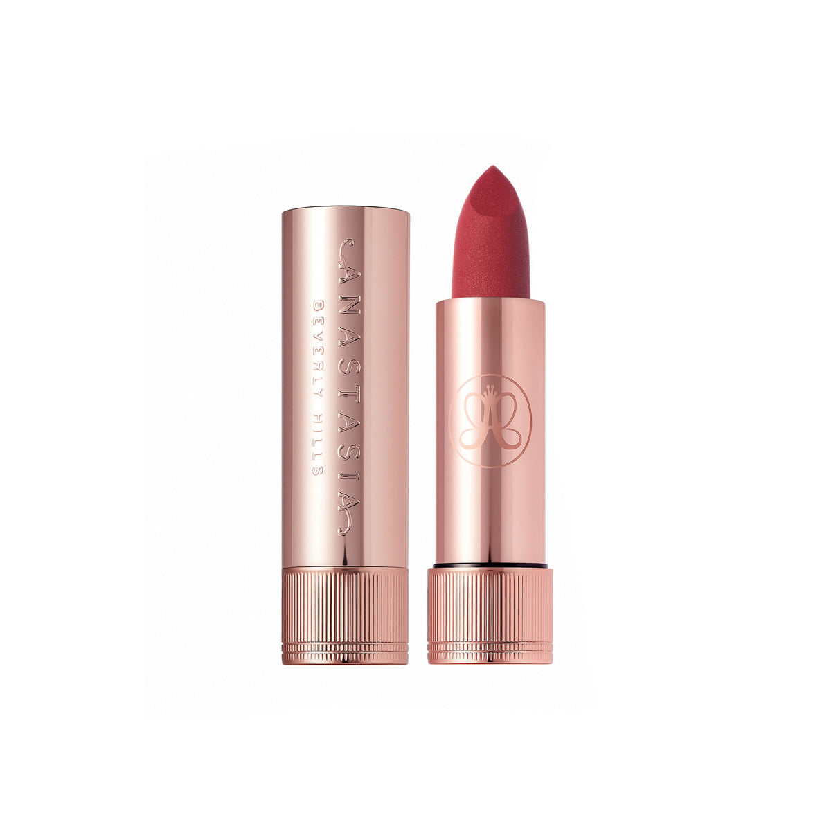 Anastasia Beverly Hills Matte Lipstick in Sugar Plum with deep purple shade and sleek packaging, close-up view.