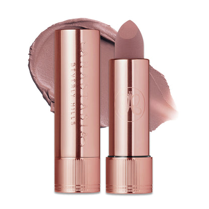 Anastasia Beverly Hills Matte Lipstick in Soft Haze, showing the lipstick tube and swatched on a neutral background.