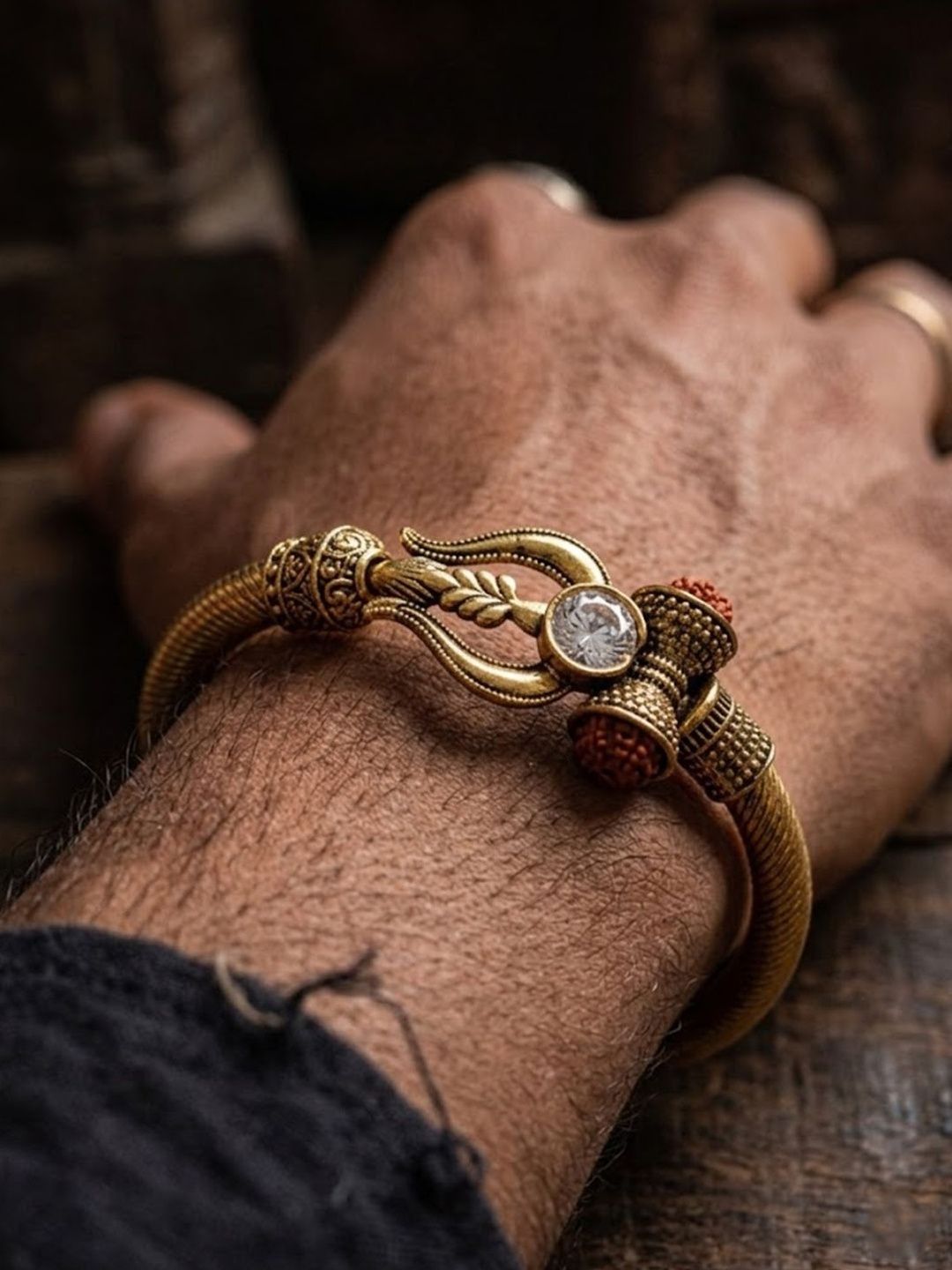Anouk Gold Plated Trishool Design Rudraksh Rakhi Bracelet With Roli Chawal Chandan Mishri