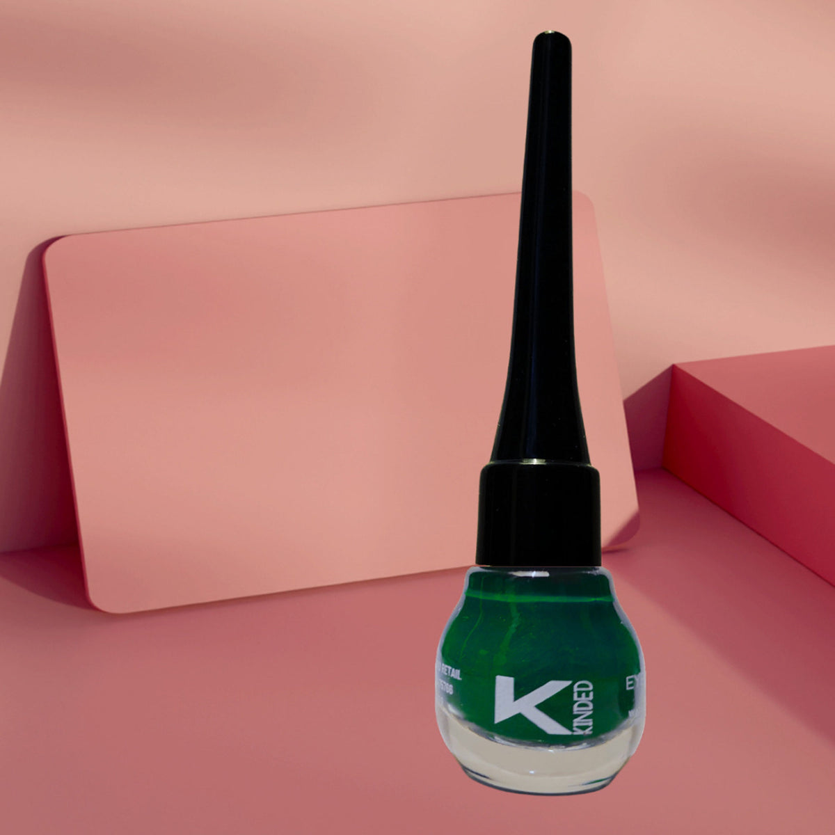 KINDED Liquid Eye Liner in Dapper Green, featuring a sleek applicator and vibrant green shade on a clean background.