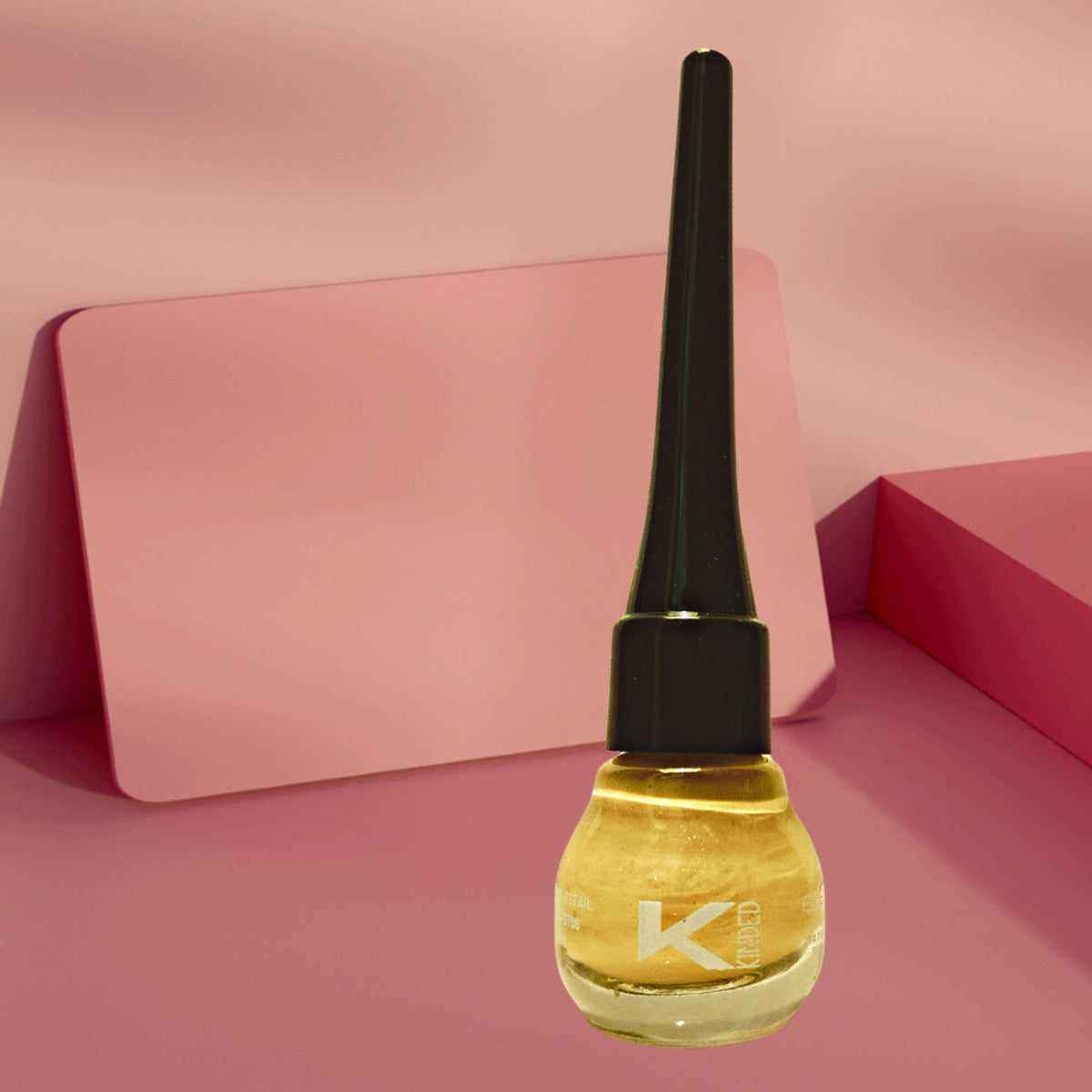 KINDED Liquid Metallic Eye Liner in Golden Glaze with a sleek applicator and shimmering gold finish.