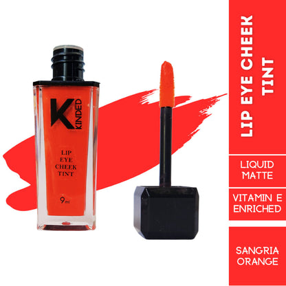 KINDED Lip, Eye & Cheek Tint in Sangria Orange with vitamin E, showing the vibrant, multi-use cosmetic product in a tube.