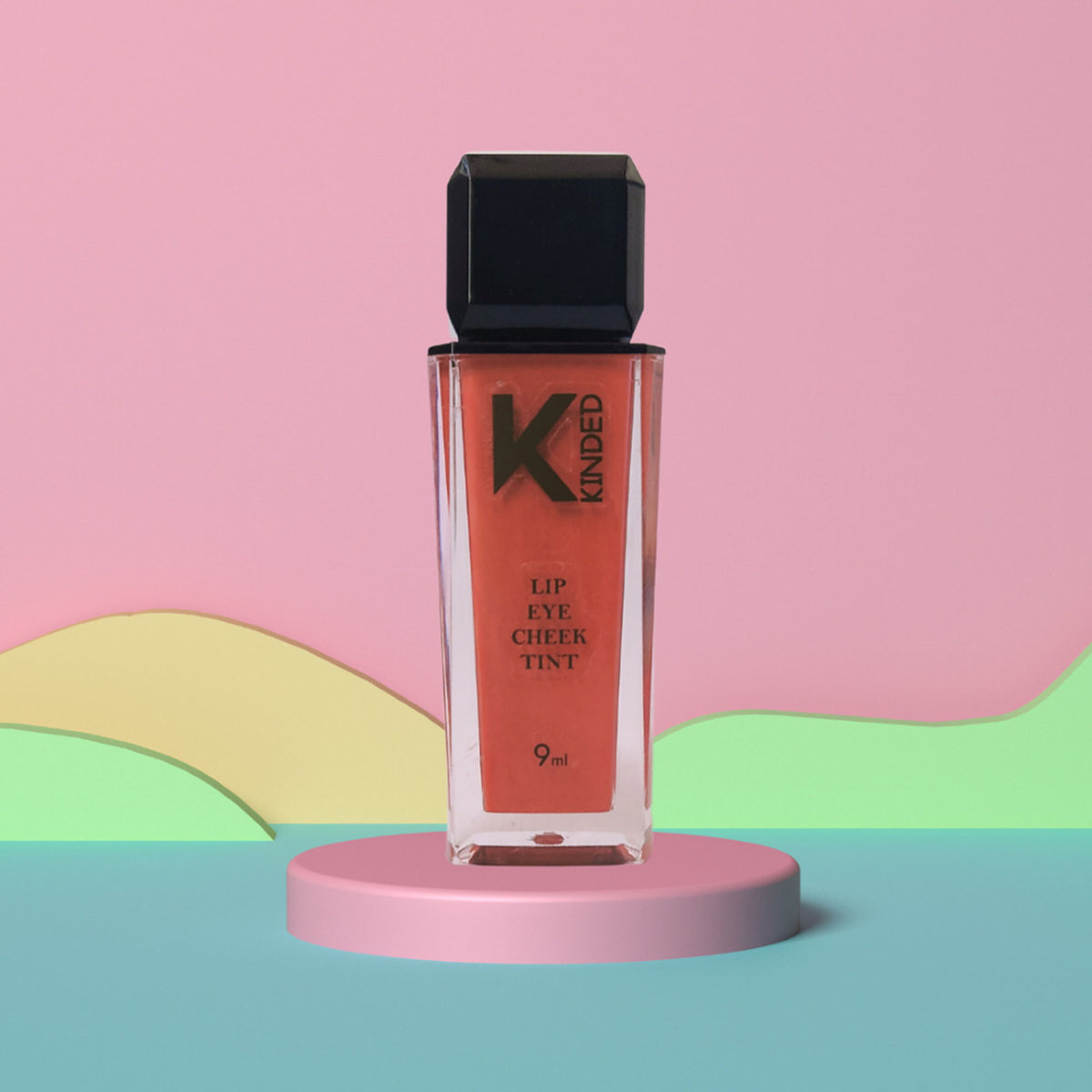 KINDED Lip, Eye & Cheek Tint in Perfect Nude, enriched with Vitamin E, showing the compact container with the product inside.