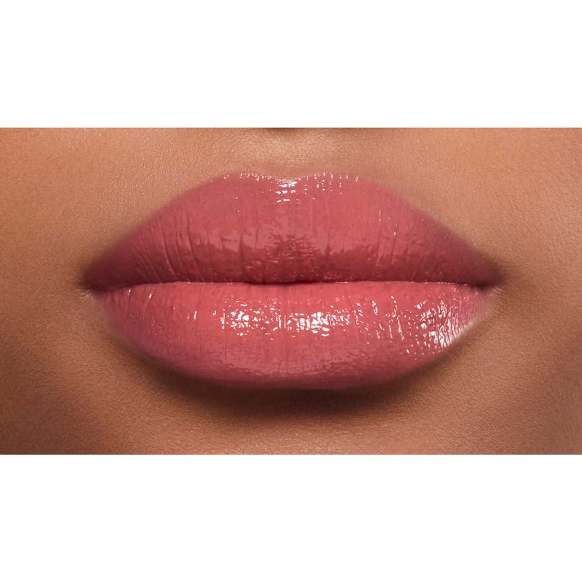 Lancome Lip Idole Butterglow Hydrating Lip Balm in shade Idole Nude, high-shine finish, smooth and moisturizing on lips