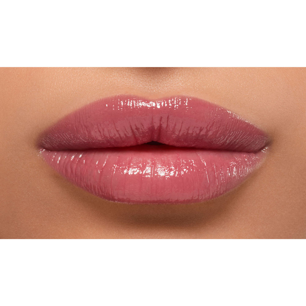 Lancome Lip Idole Butterglow hydrating lip balm in shade 47 Mauve Tivation, featuring high-shine finish and moisturizing texture.