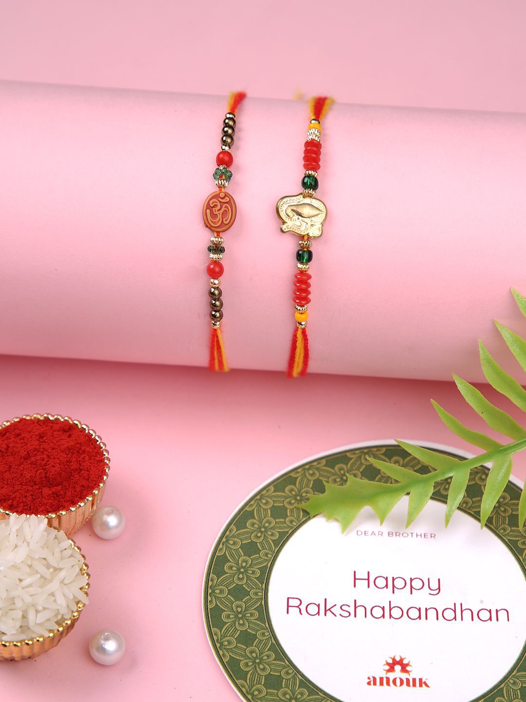 Anouk Set Of 2 Red Om & Lord Ganesh Beaded Rakhi With Roli Rice & Greeting Card