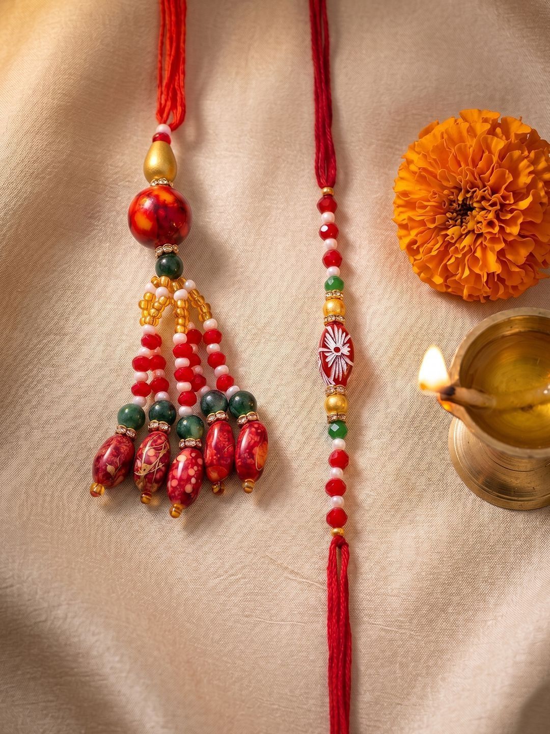 Anouk Set Of 2 Designer Red Artificial Beads Bhaiya Bhabhi Rakhi With Roli Chawal Chandan