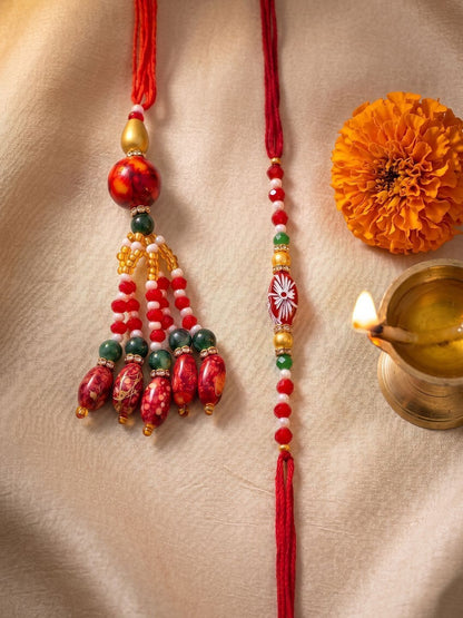 Anouk Set Of 2 Designer Red Artificial Beads Bhaiya Bhabhi Rakhi With Roli Chawal Chandan