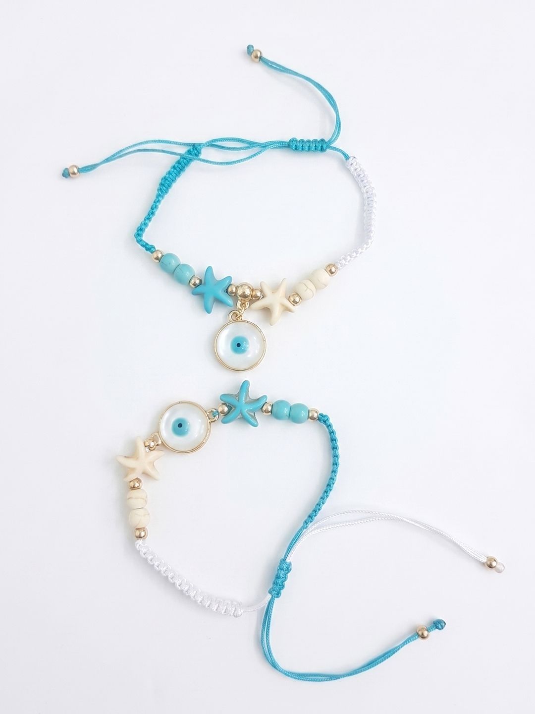 Anouk Set Of 2 Blue Evil Eye & White Pearl Bhaiya Bhabhi Rakhi With Roli Chawal Chandan