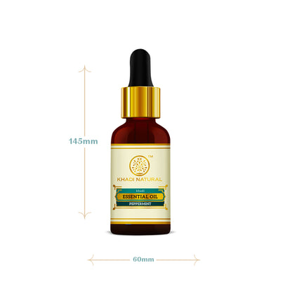 Khadi Natural Peppermint Essential Oil bottle with leaves, used for headache and nausea relief, natural herbal remedy.