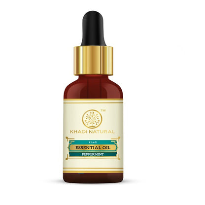 Khadi Natural Peppermint Essential Oil bottle with peppermint leaves, used for headache and nausea relief.