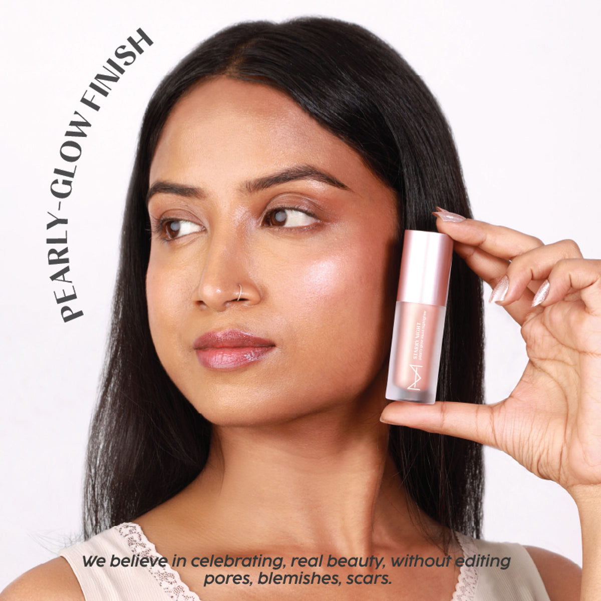 House of Makeup Starry Night Pearly Glow Liquid Highlighter in Starburst, showcasing a luminous, pearly makeup highlighter with a sleek bottle.