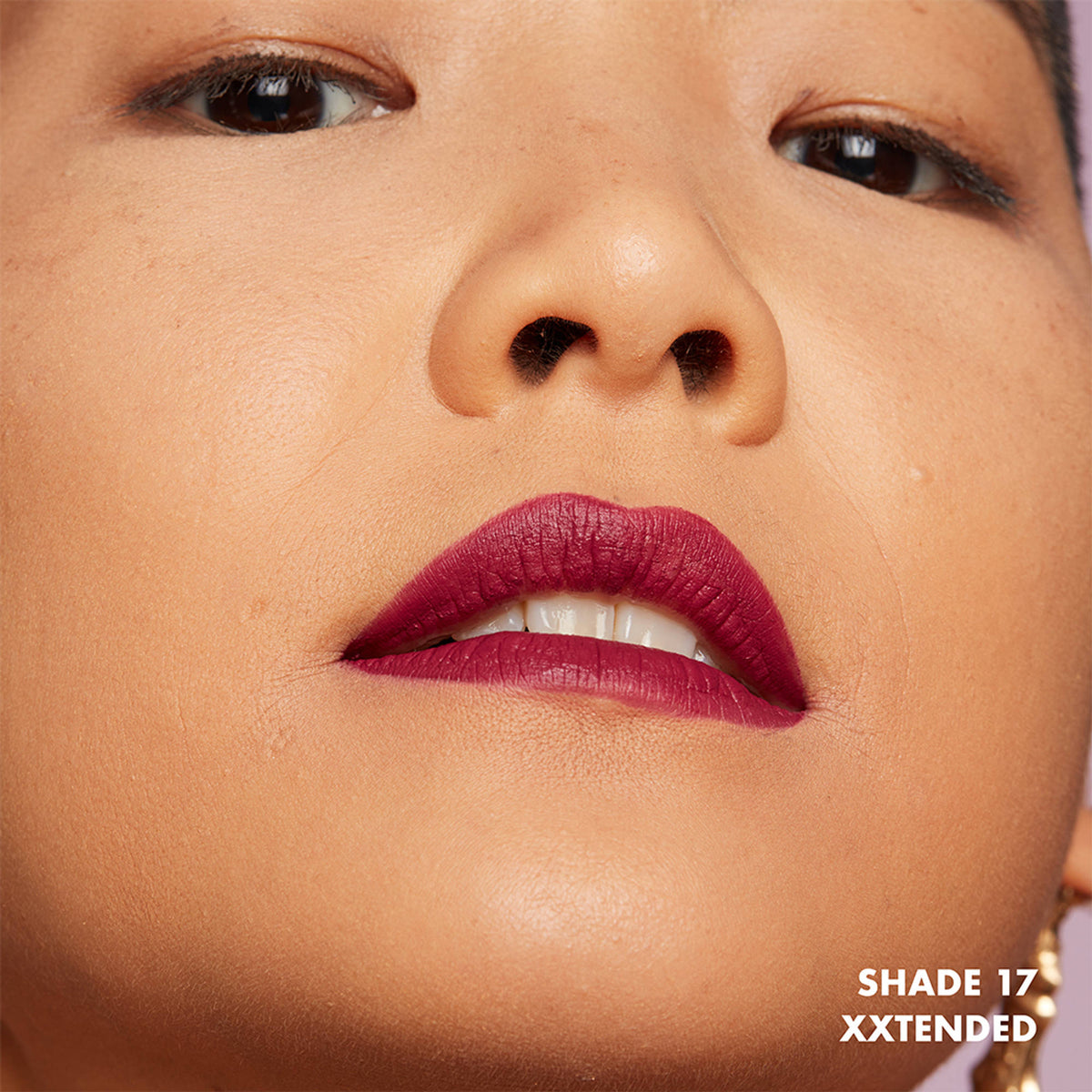 NYX Professional Makeup Lip Lingerie XXL Matte Liquid Lipstick in a nude shade, showing the sleek tube and applicator.