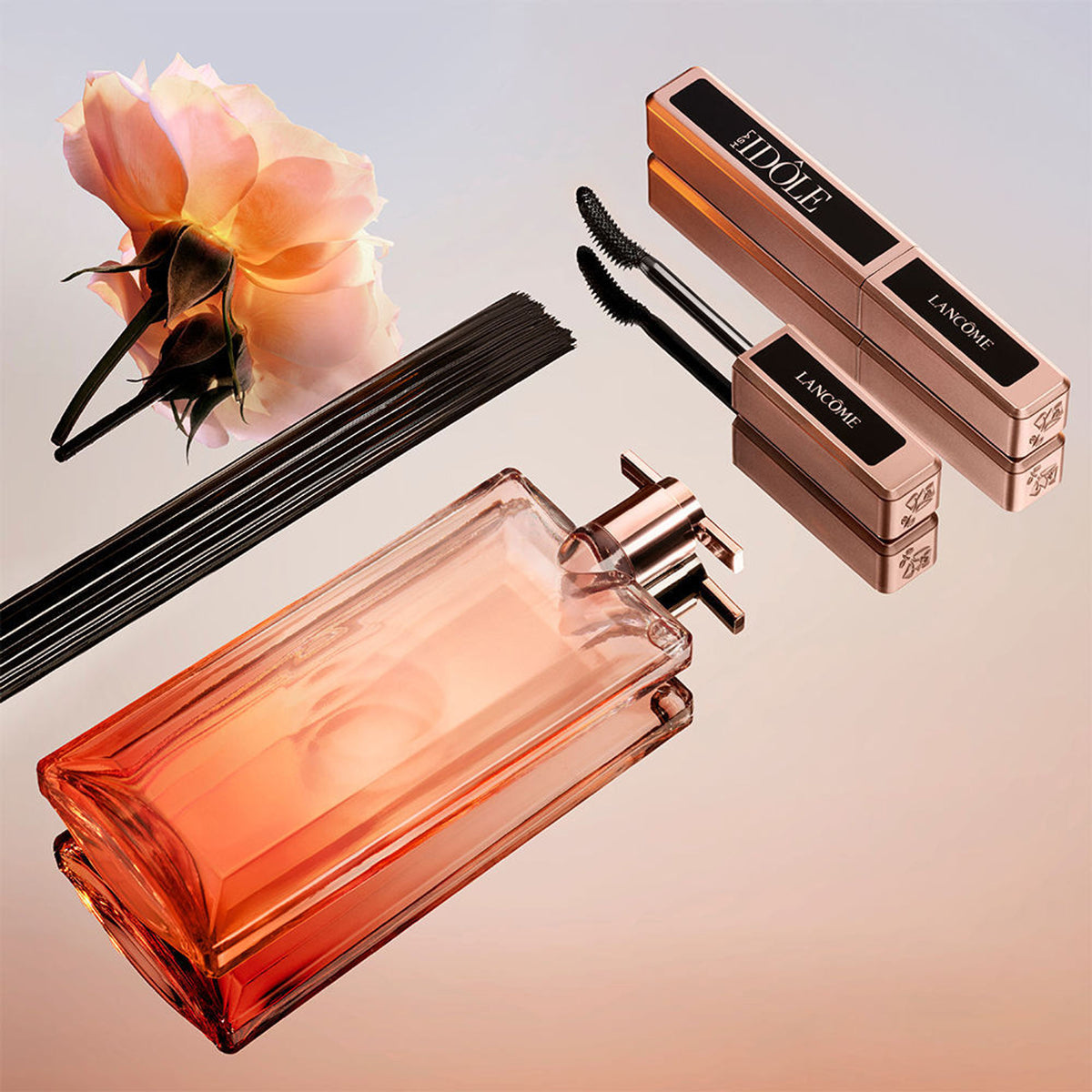 Lancome Lash Idole mascara for women with a sleek black tube, showcasing a mascara wand with volumizing and lifting effects.