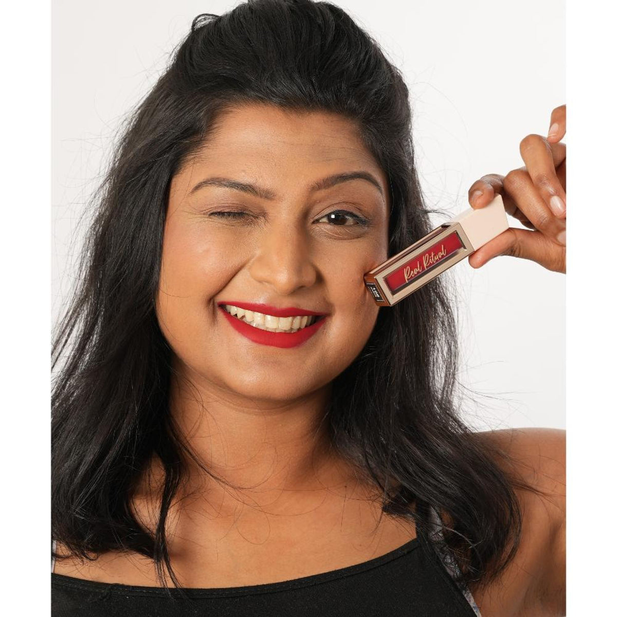 The Real Ritual Liquid Matte Lipstick in shade 106 Zarya, featuring a smooth, long-lasting liquid lipstick applicator and vibrant color.