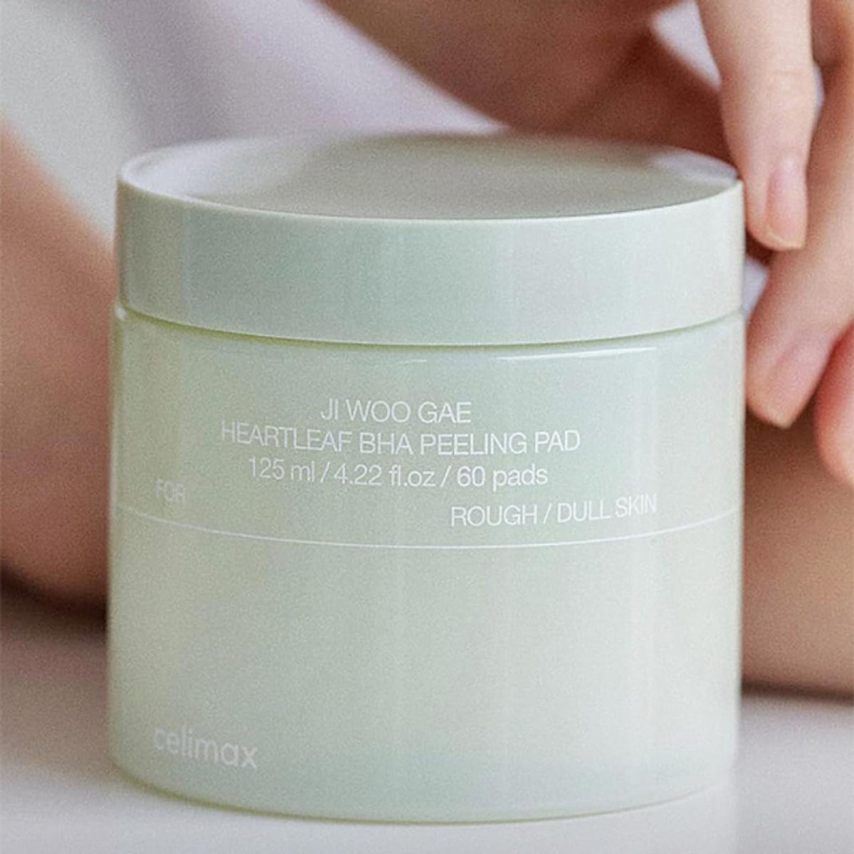 Celimax Ji Woo Gae Heartleaf BHA Peeling Pad with exfoliating and calming properties, controls sebum for clear skin.