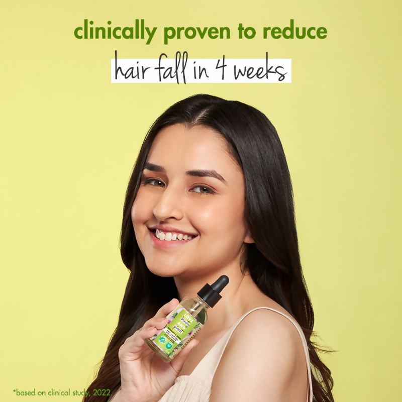 Love Beauty and Planet Onion & Rosemary anti-hair fall scalp serum in a clear bottle with dropper applicator.