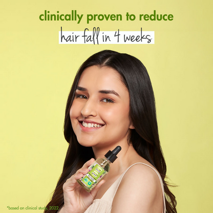 Love Beauty and Planet Onion & Rosemary anti-hair fall scalp serum in a clear bottle with dropper applicator.
