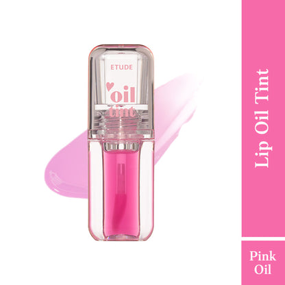 ETUDE Dear Darling Oil Tint in shade 06 Pink, close-up of the lip tint applicator with pink tint product on the brush.