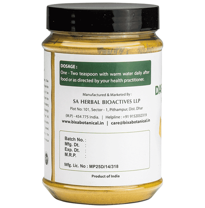 Bixa Botanical Daruharidra powder, Ayurvedic herbal powder in a clear container, showcasing the fine, light brown powder.
