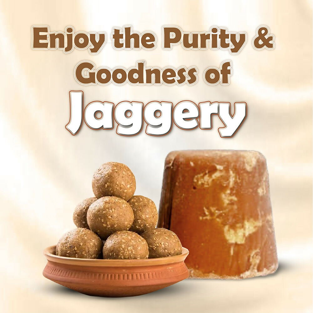 Naivedyam chemical free jaggery cubes showing golden brown, textured jaggery pieces in a clear bowl.
