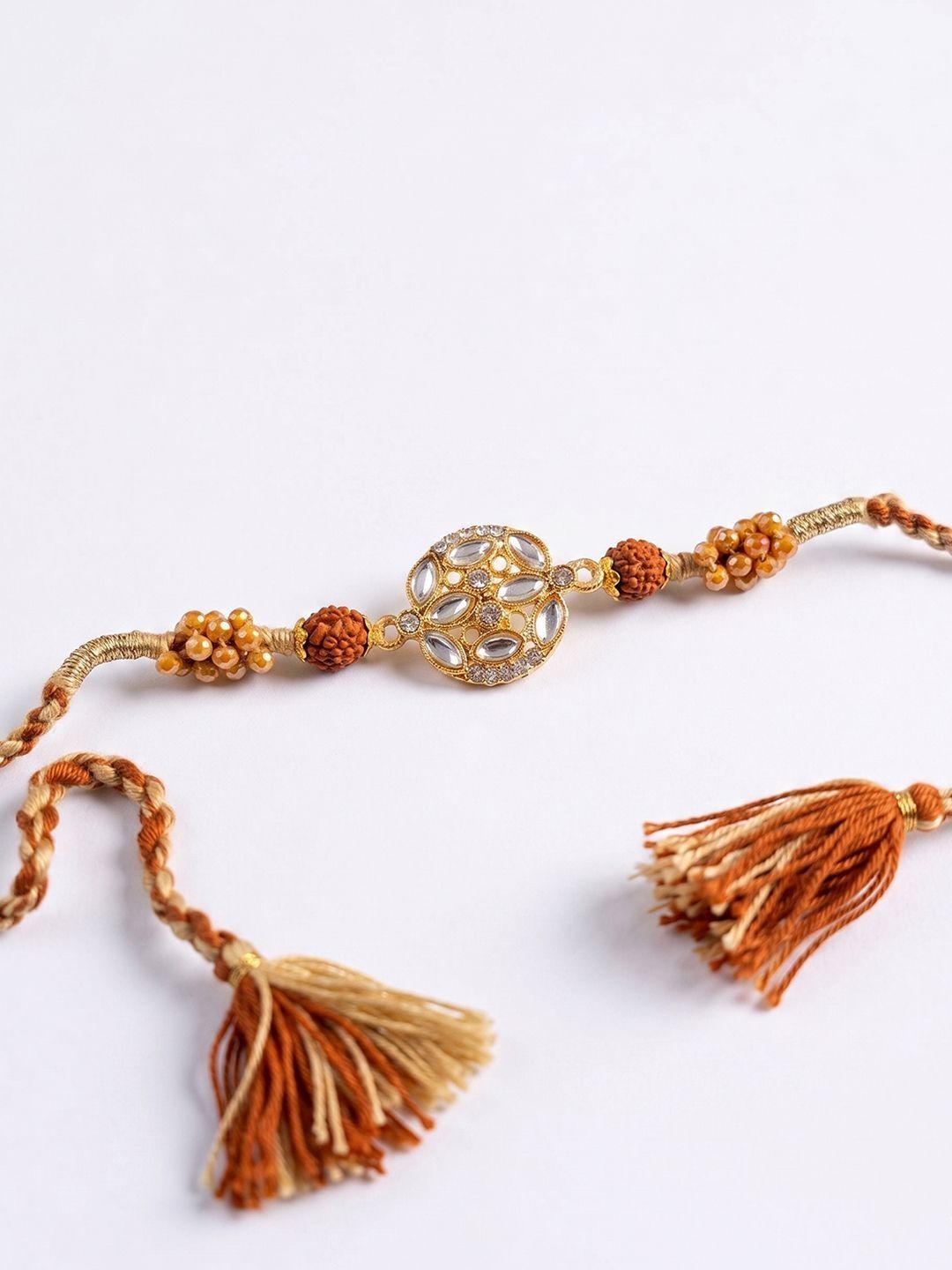 Anouk Rudraksh & Kundan Studded Gold Toned Thread Rakhi With Roli Chawal Chandan Mishri