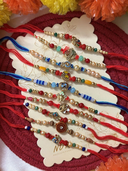 Anouk Set Of 10 Artificial Stones & Beads Thread Rakhi With Roli Chawal Chandan Mishri