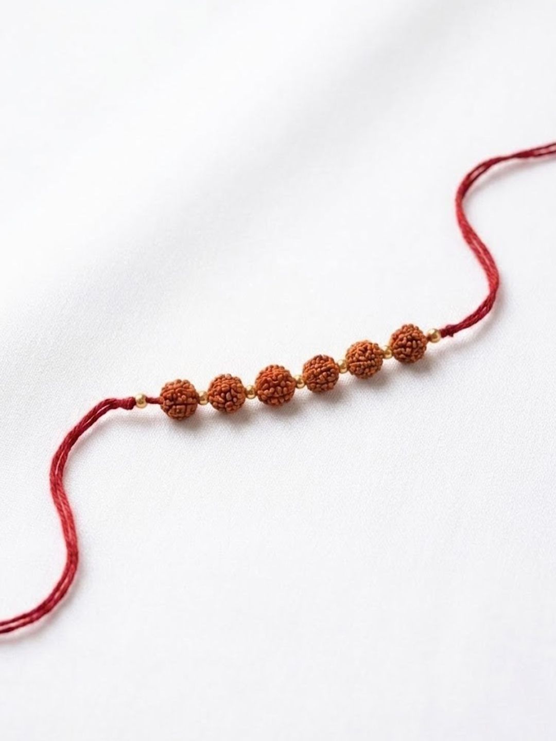 Anouk Religious Rudraksh Thread Rakhi With Roli Chawal Chandan Mishri