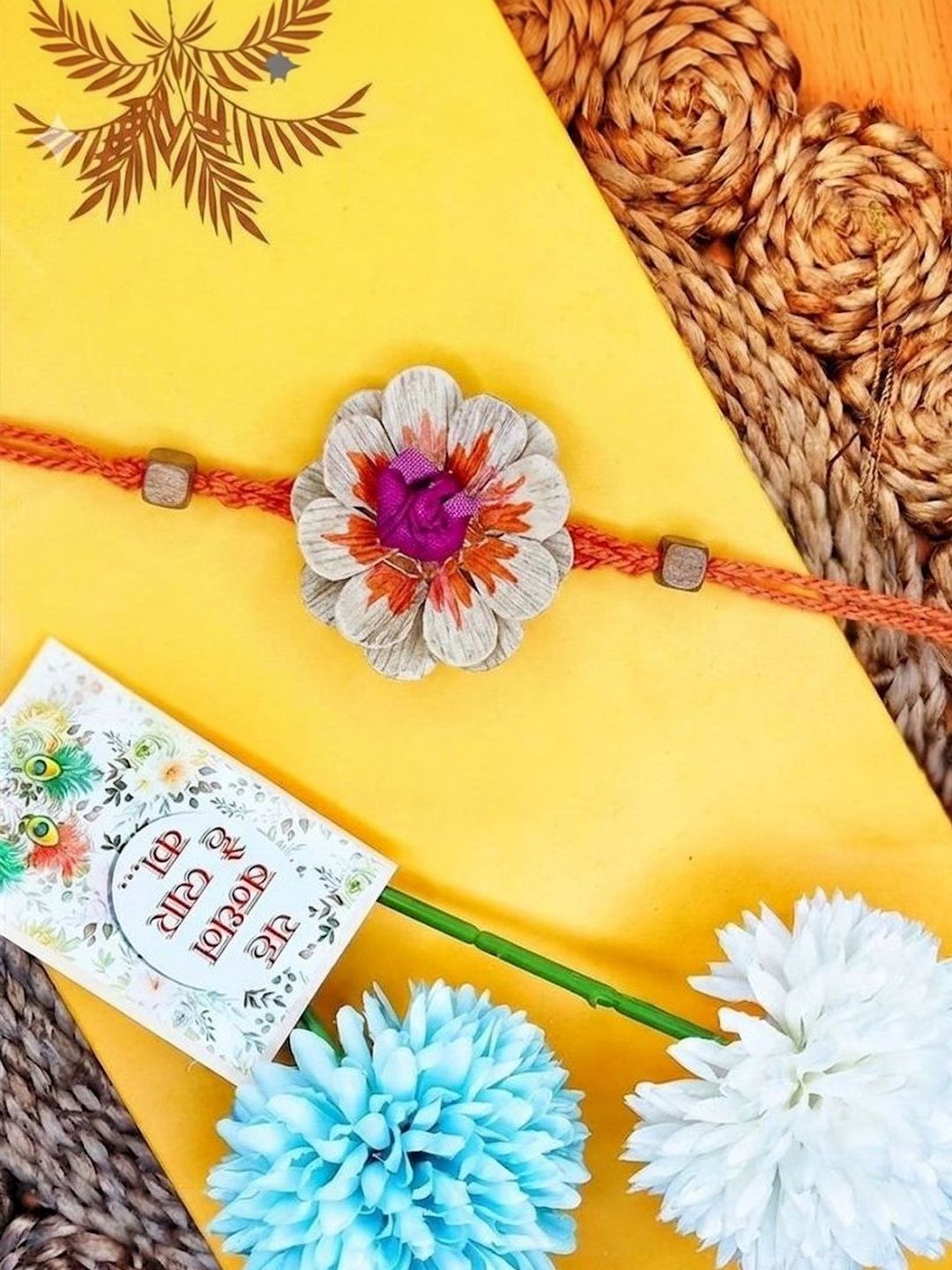 Anouk Multicolor Floral Design Plant Seed Rakhi With Roli Chawal Chandan Mishri