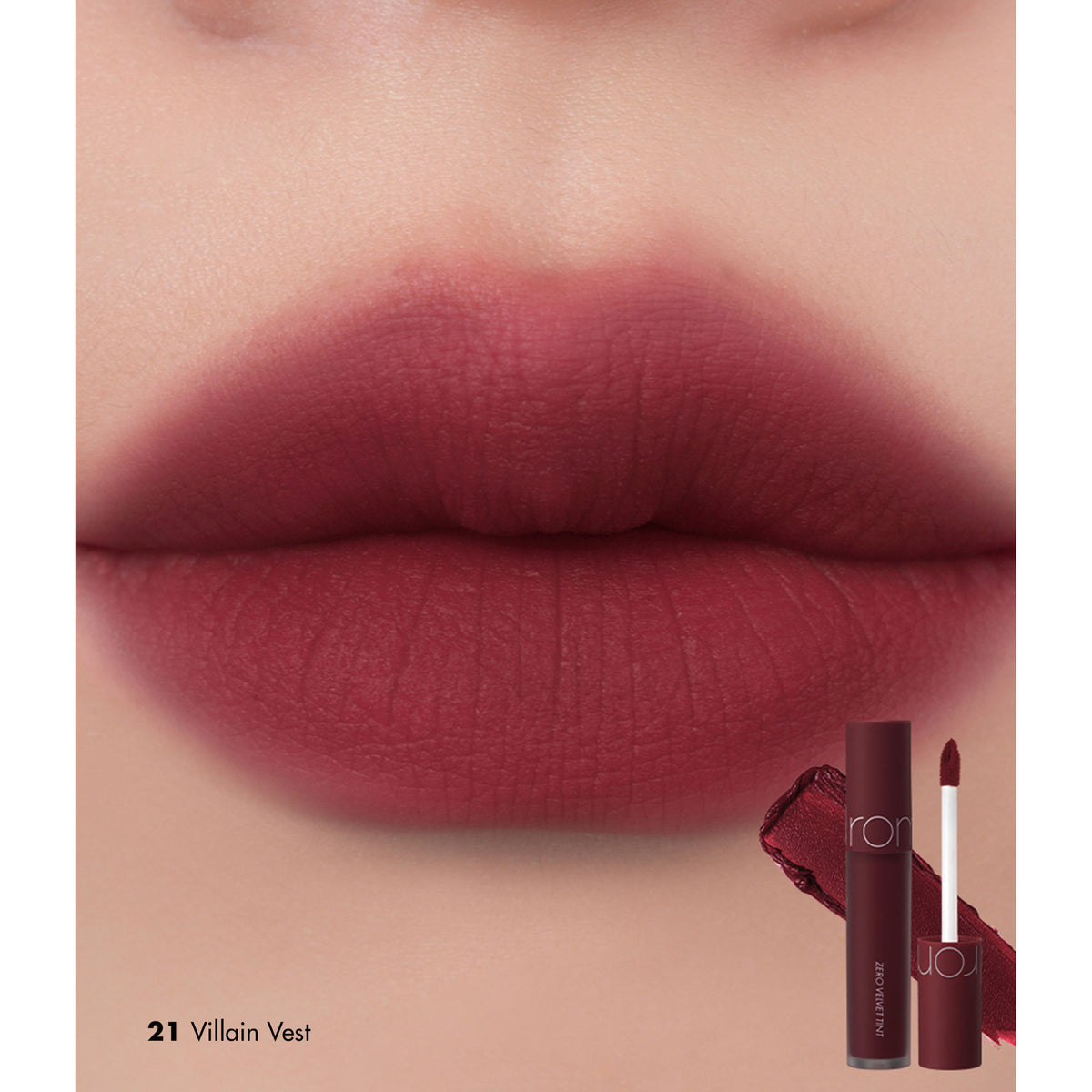 Rom&nd Zero Velvet Tint in shade 21 Villain Vest, showcasing the creamy, matte lipstick with vibrant color on lips.
