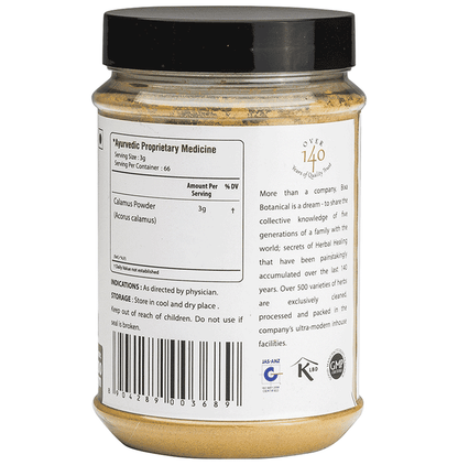 Bixa Botanical Vacha Powder, Ayurvedic herbal powder in a glass jar with a scoop, used for traditional herbal remedies.