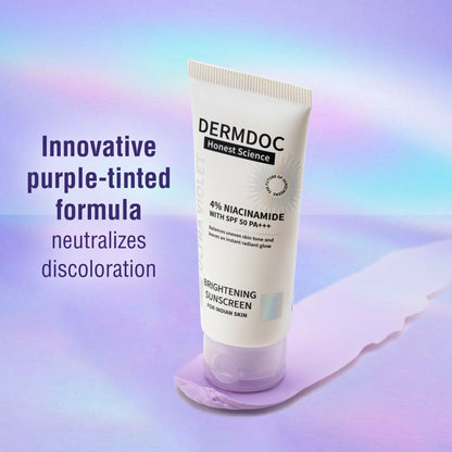 Dermdoc 4% Niacinamide SPF 50 PA+++ brightening sunscreen in a tube, offering sun protection and skin brightening benefits.