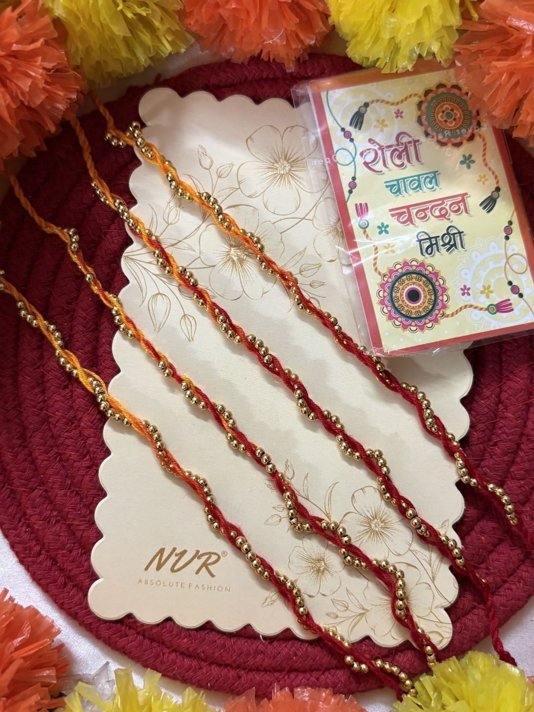Anouk Set Of 4 Yellow & Red Thread Rakhi With Roli Chawal Chandan Mishri