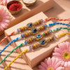 Dhiyona Set Of 4 Multicolor Evil Eye Thread Rakhi With Roli Chawal Chandan Mishri