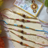 Dhiyona Set Of 6 Rudraksh & Artificial Beads Thread Rakhi With Roli Chawal Chandan Mishri