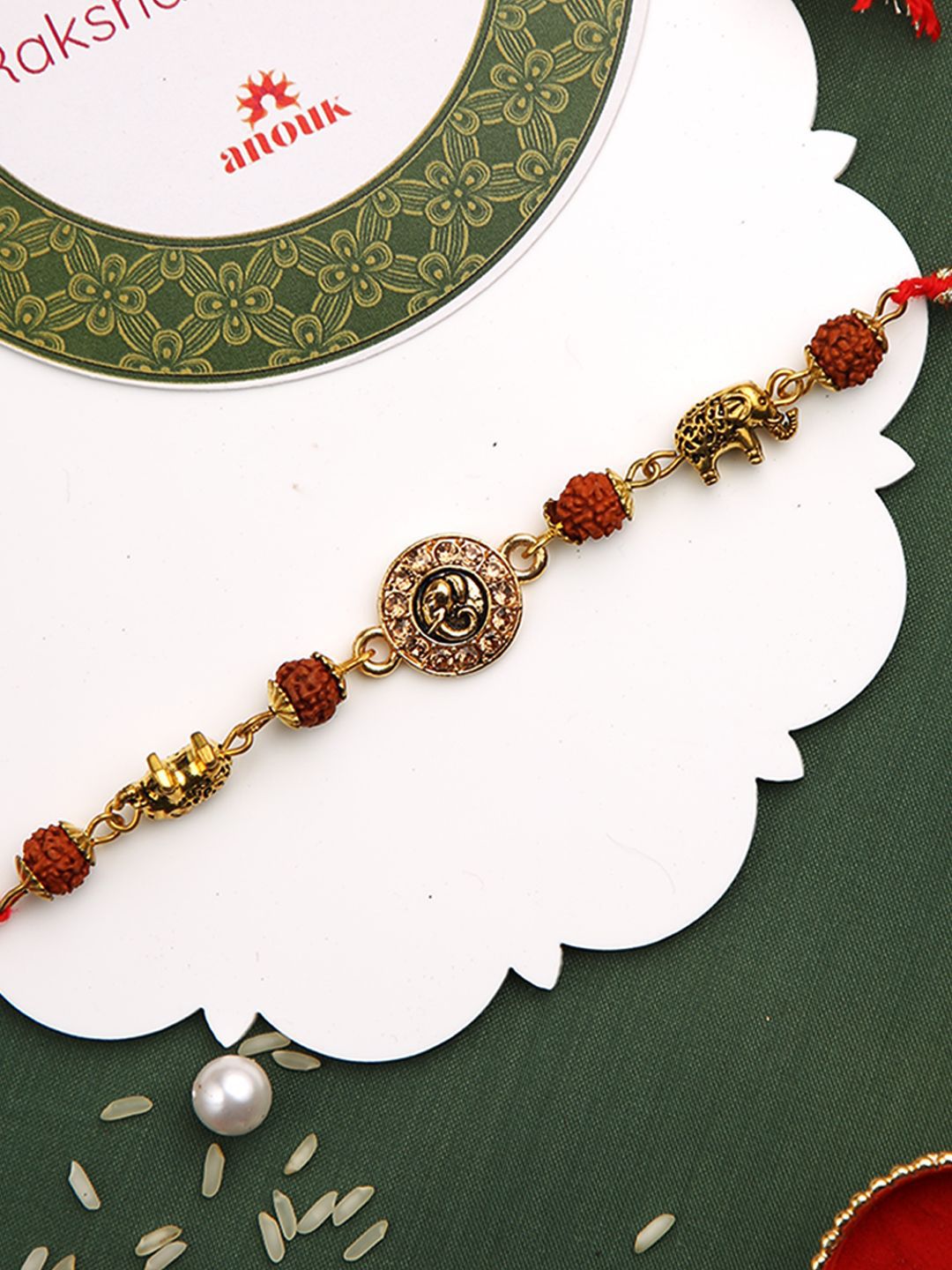 Anouk Stones Studded & Rudhraksh Beaded Rakhi With Roli Chawal & Greeting Card
