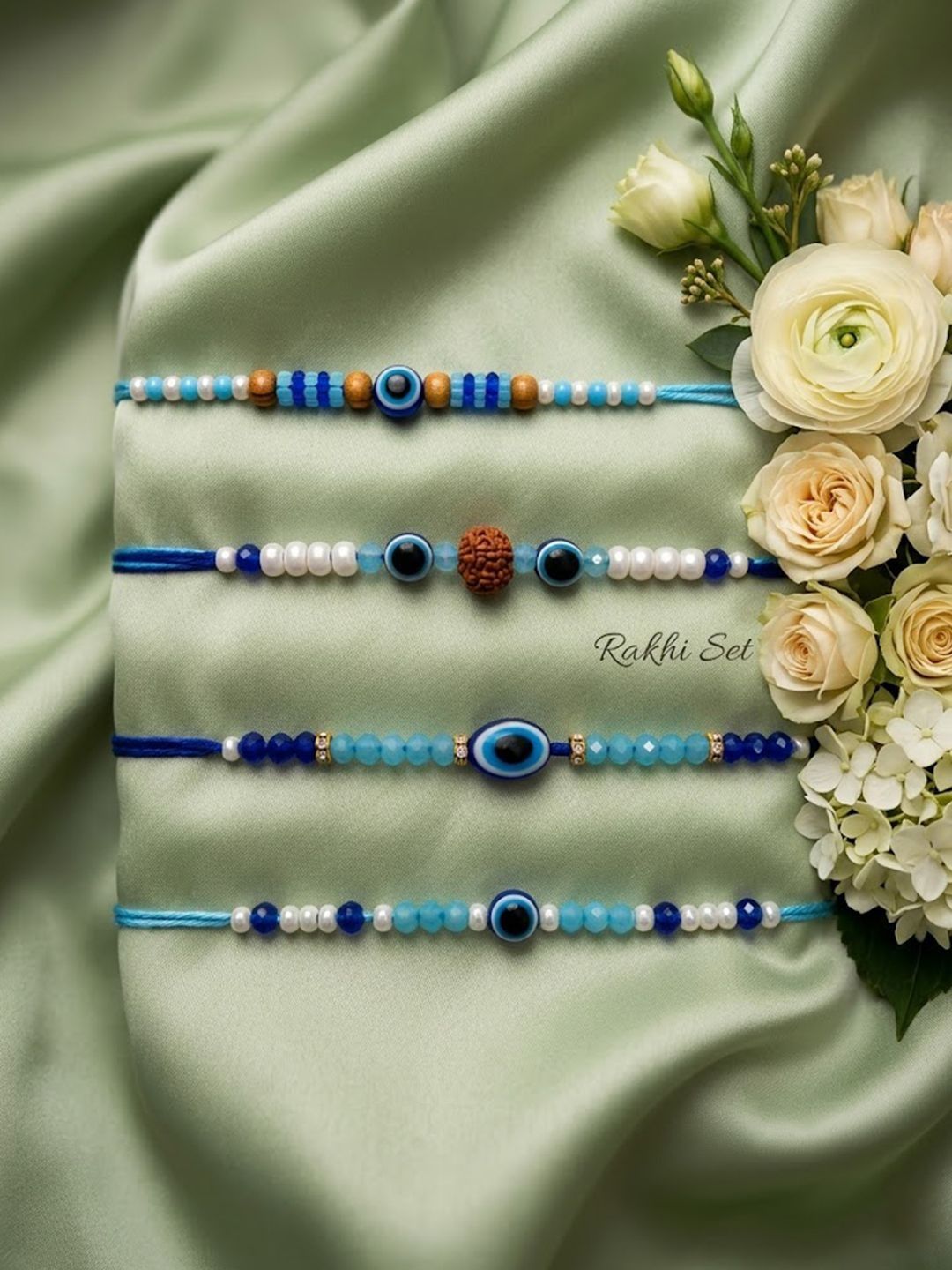 Anouk Set Of 4 Blue Evil Eye Thread Rakhi With Roli Chawal Chandan Mishri