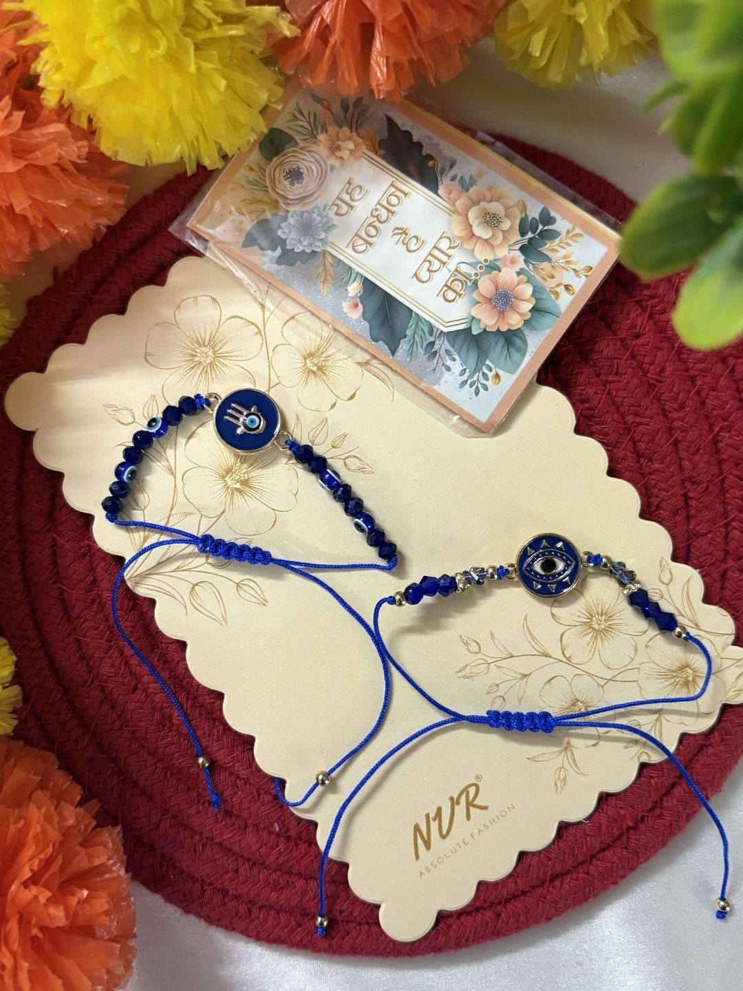 Anouk Set Of 2 Blue Evil Eye Thread Rakhi With Roli Chawal Chandan Mishri
