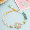 Dhiyona Artificial Stones & Beads Floral Wraparound Rakhi With Roli Chawal Chandan Mishri