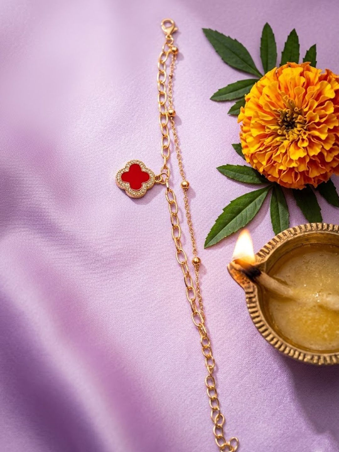 Anouk Women Artrificial Stones Gold Plated Rakhi With Roli Chawal Chandan Mishri