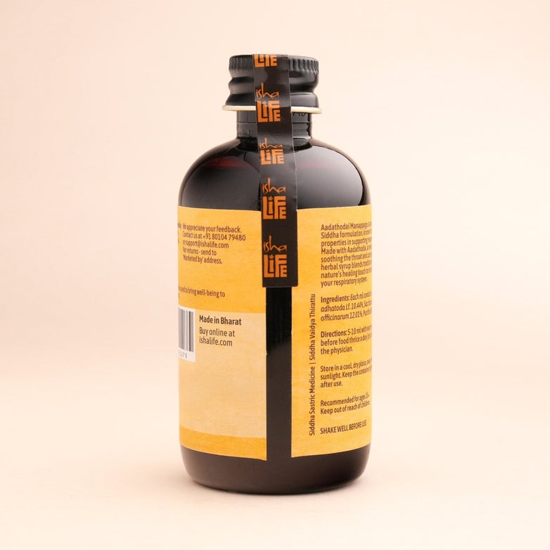 Isha Life Herbex Cough Syrup bottle with label, showing the herbal syrup inside and the product packaging.