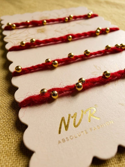 Anouk Set Of 4 Traditional Red Thread Rakhi With Roli Chawal Chandan Mishri