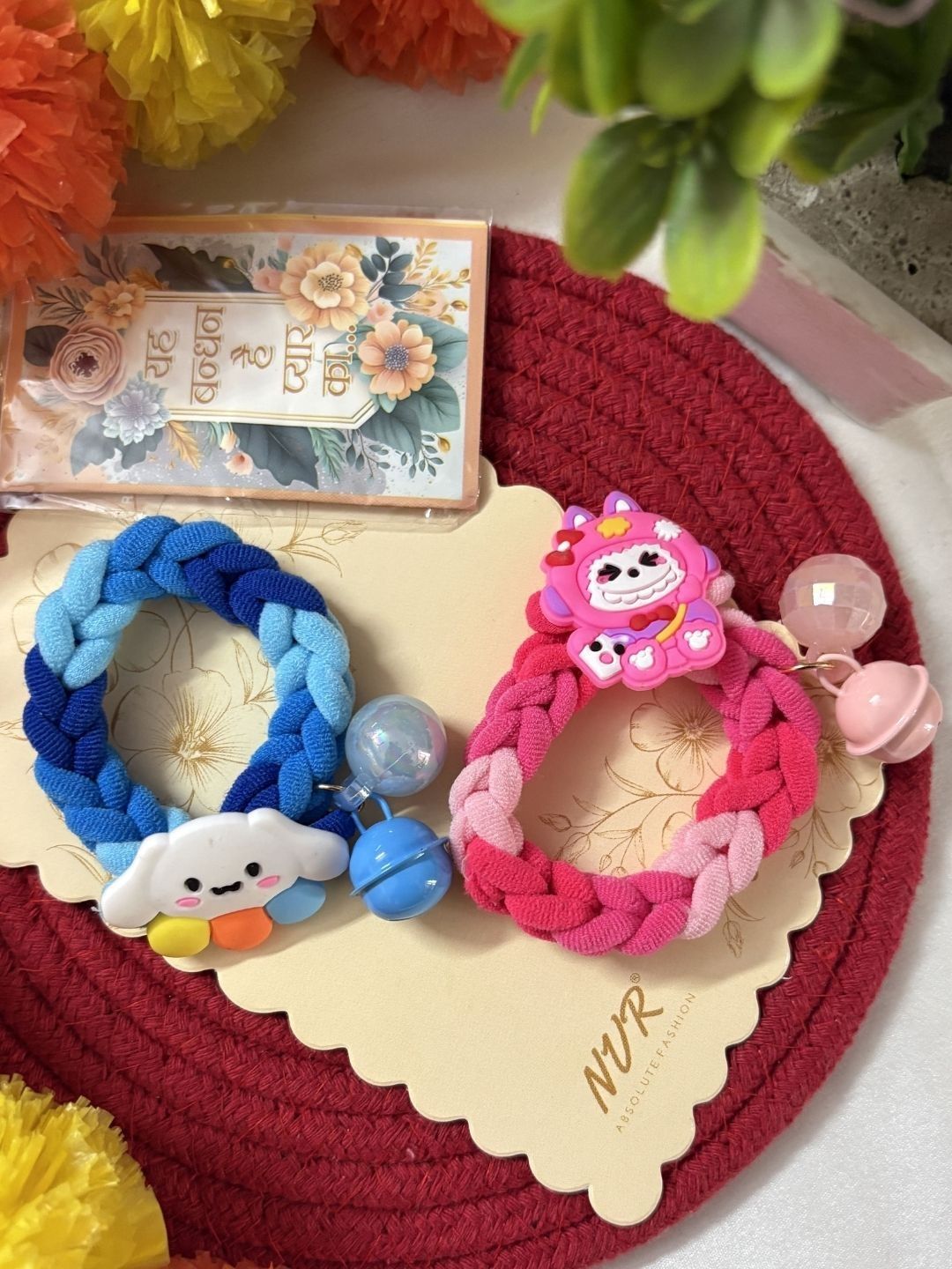 Anouk Set Of 2 Blue & Pink Kids Rakhi With Roli Chawal Chandan Mishri