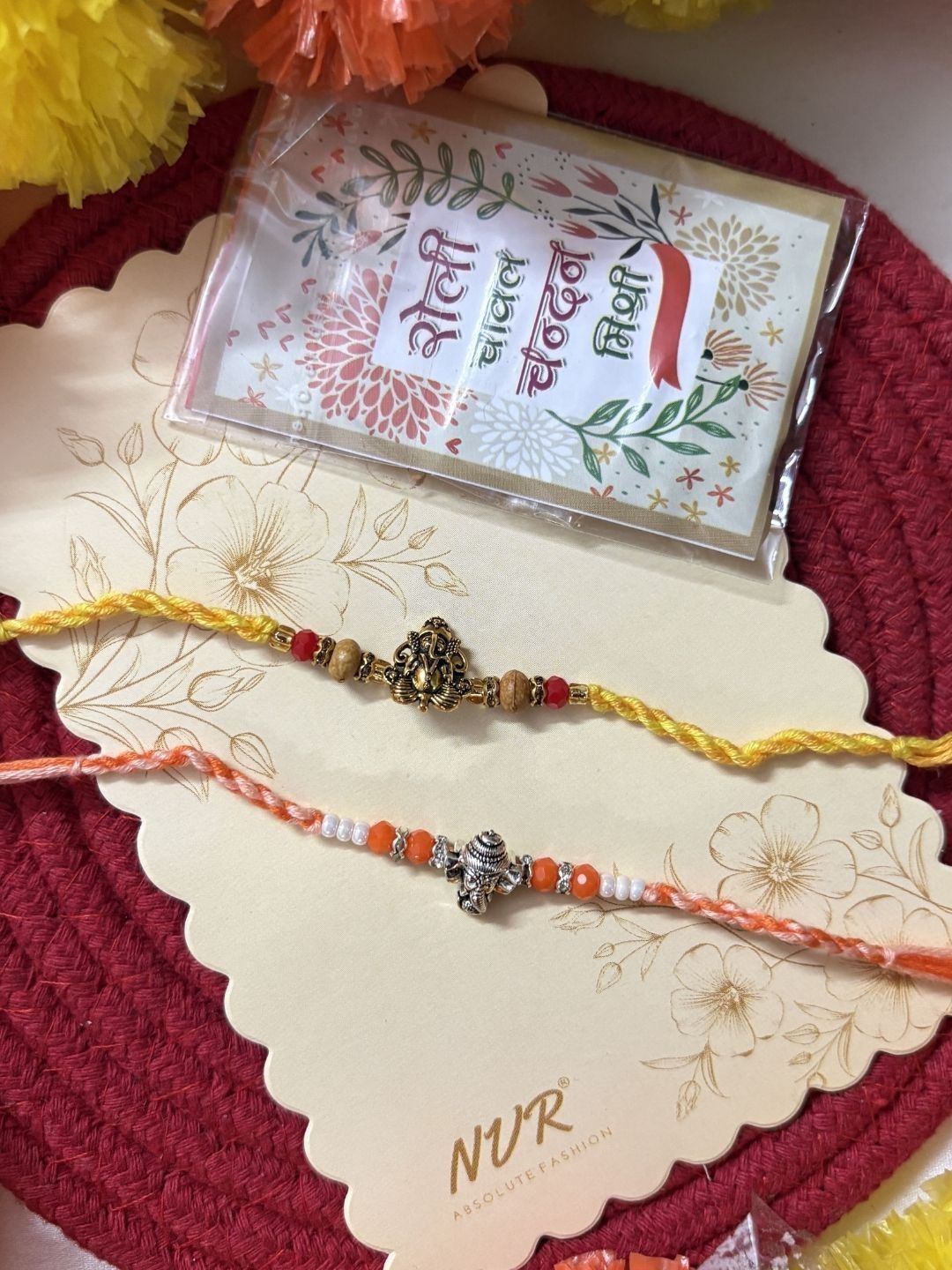 Anouk Set Of 2 Multicolor Religious Thread Rakhi With Roli Chawal Chandan Mishri
