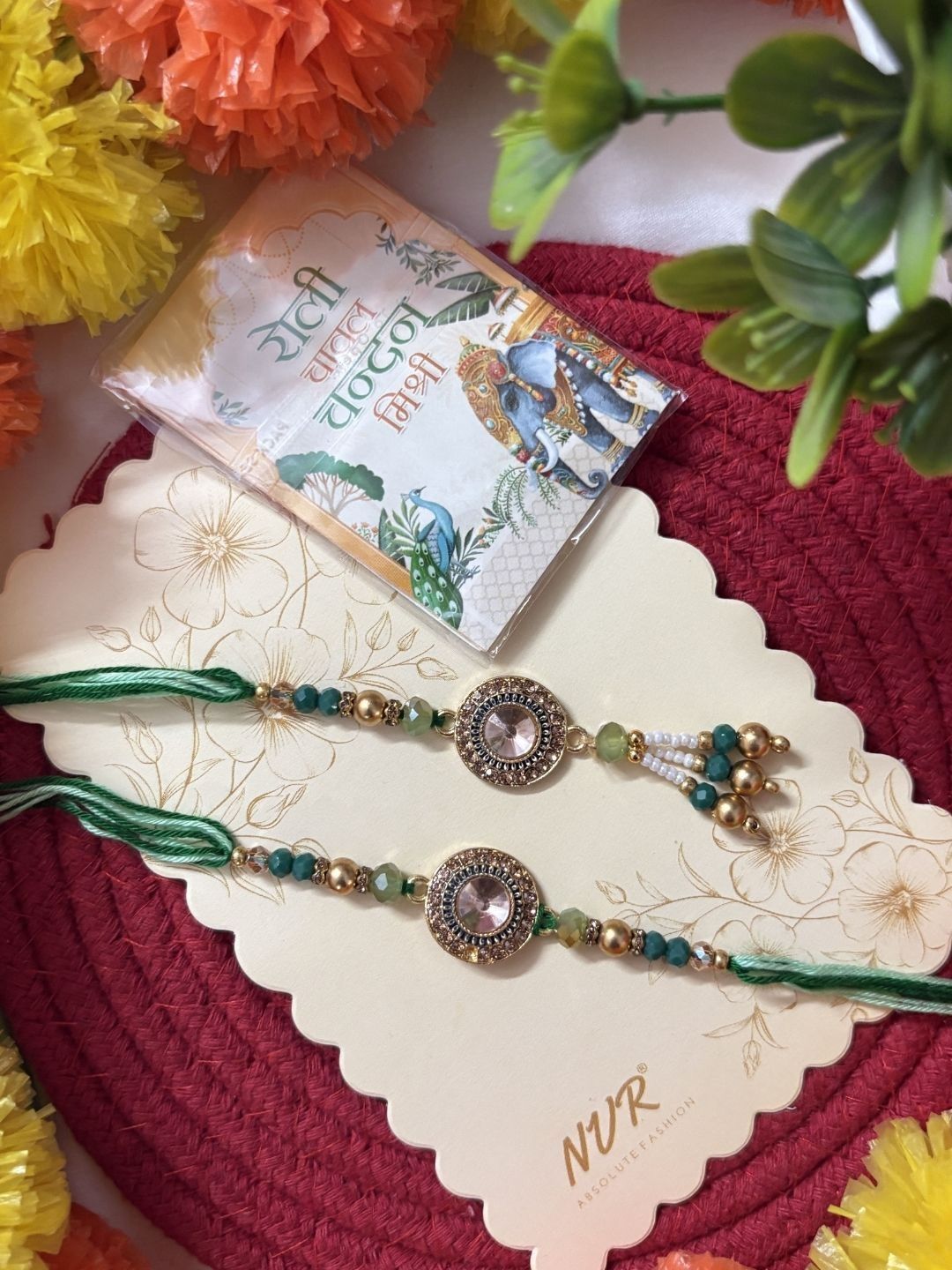 Anouk Set Of 2 Ad Drawstring Bhaiya Bhabhi Rakhi With Roli Chawal Chandan Mishri
