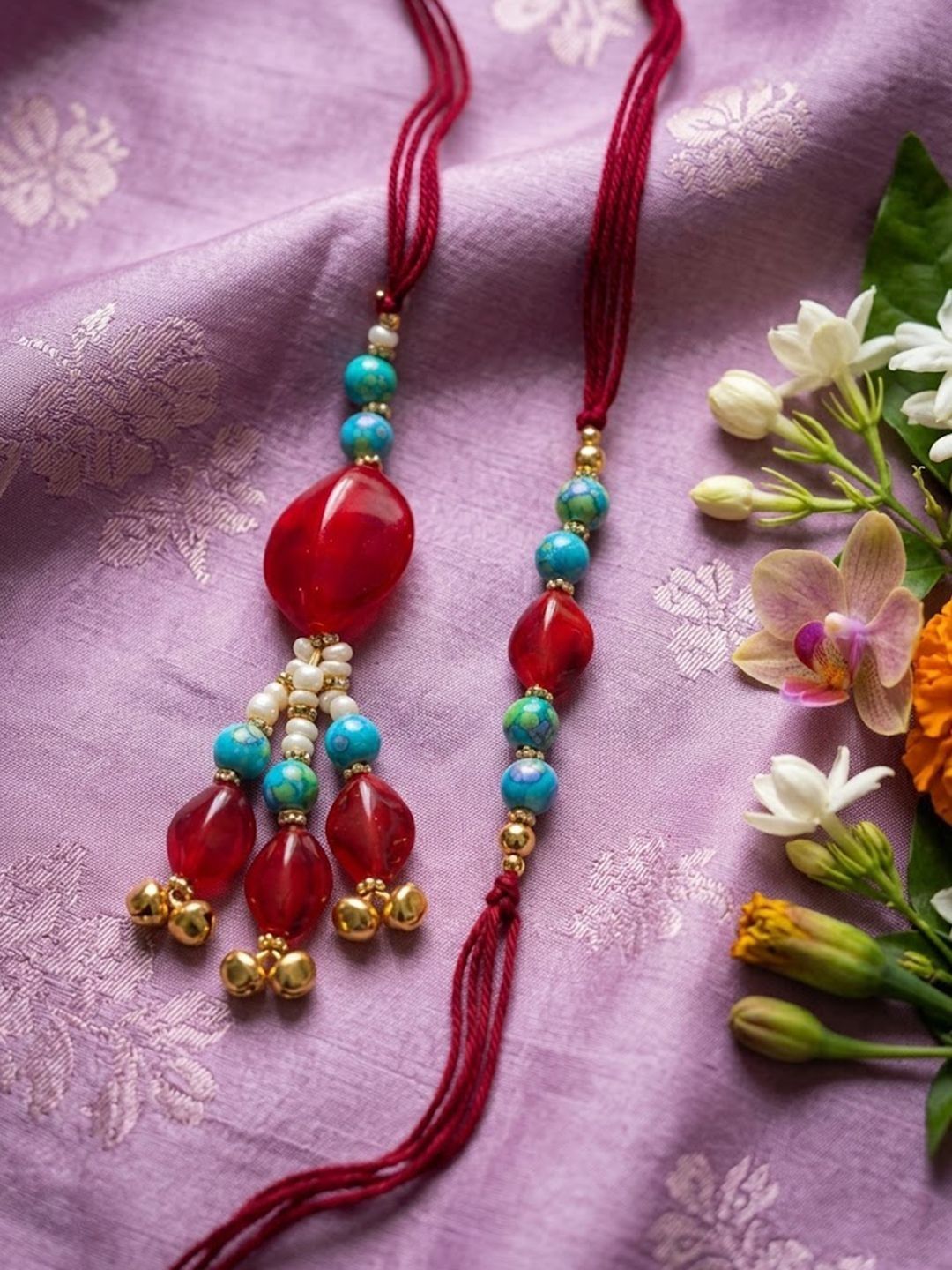 Anouk Set Of 2 Artificial Beads & Gold Toned Ghungroo Bhaiya Bhabhi Rakhi With Roli Chawal