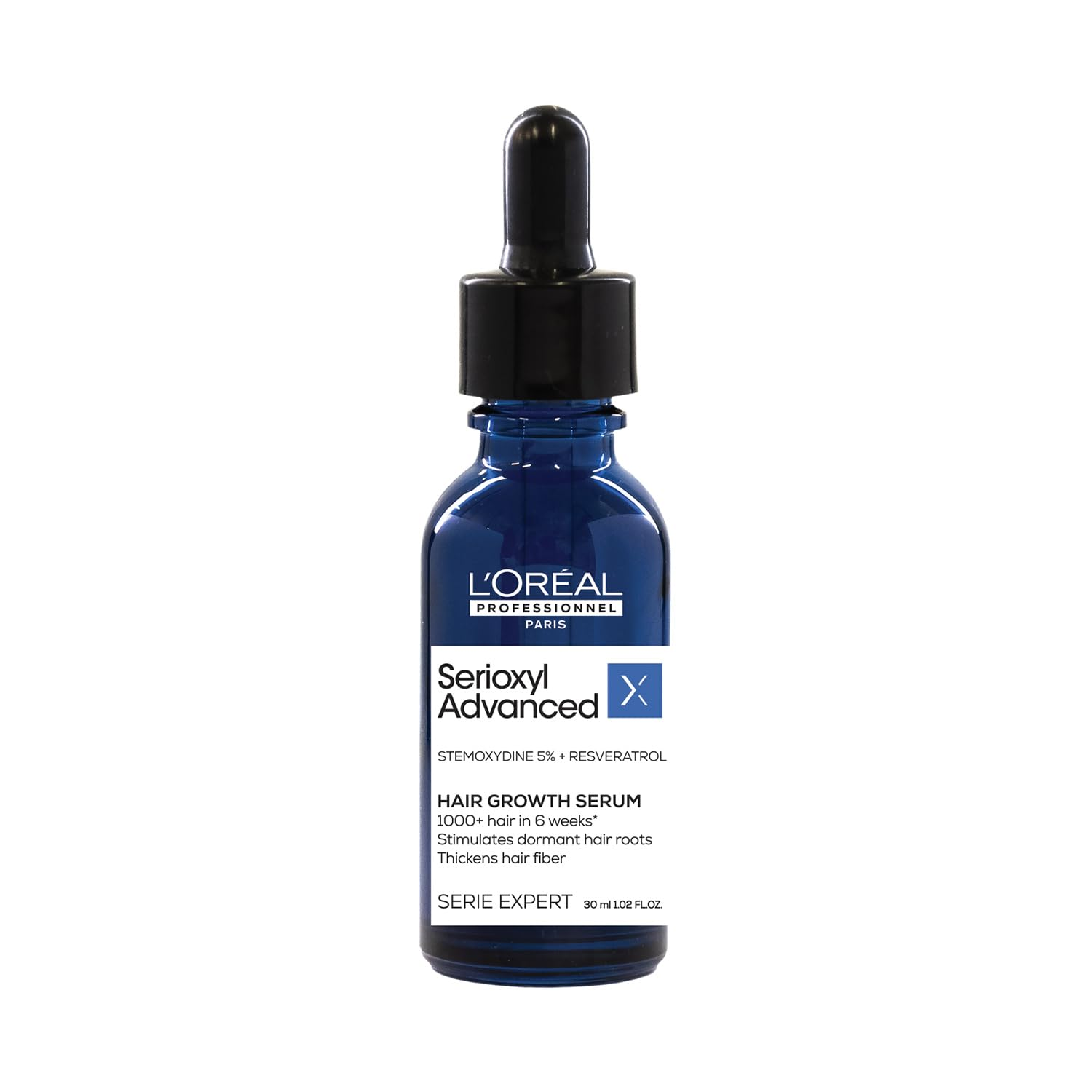 L'Oreal Professionnel Serioxyl Advanced Density Activator hair serum bottle with label and pump for thinning hair treatment.