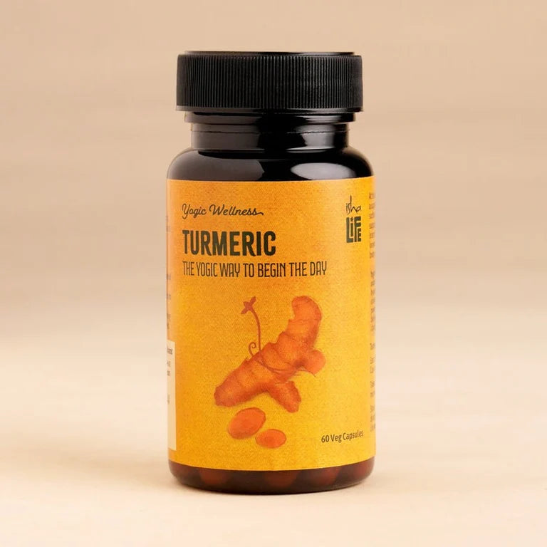 Isha Life Neem and Turmeric Capsules in a bottle, Ayurvedic supplement with orange and green capsules for immune support
