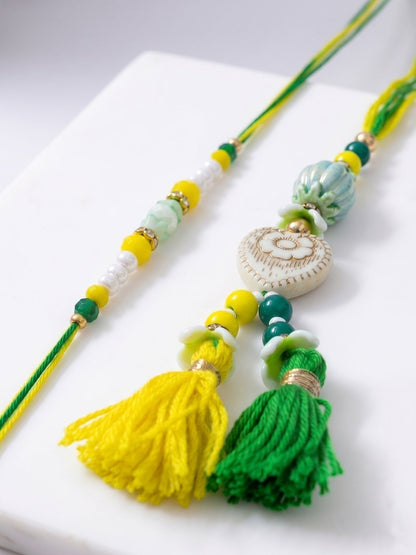Anouk Set Of 2 Green & Yellow Beaded Heart Shape Bhaiya Bhabhi Rakhi With Roli Chawal